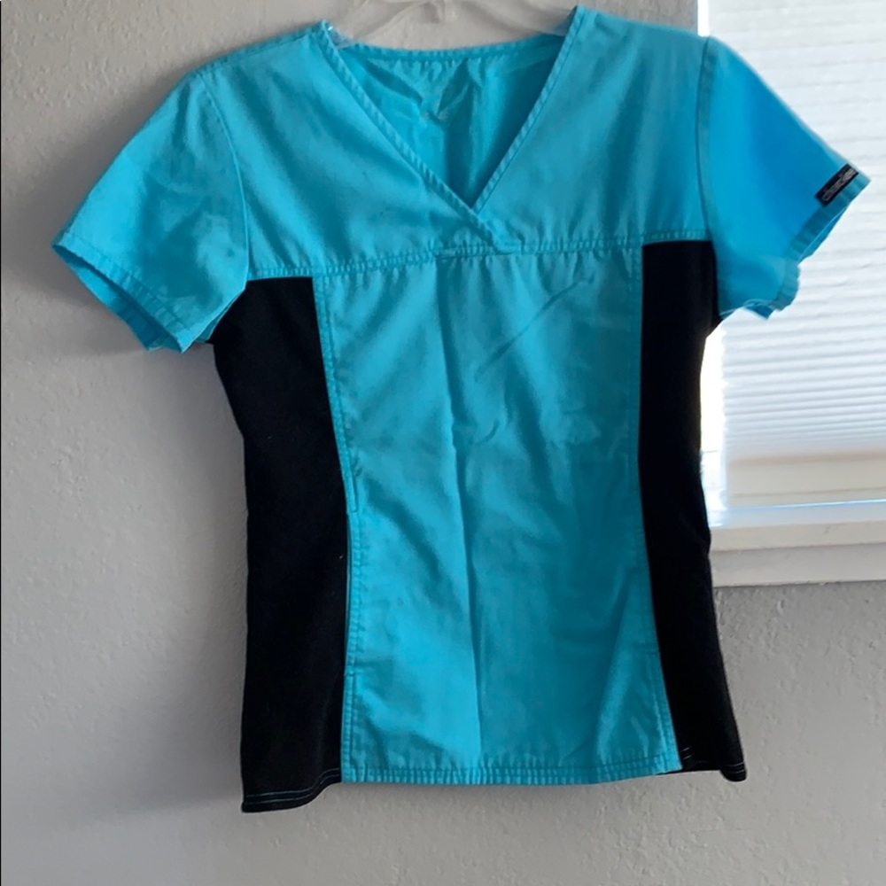Blue scrub top with pockets